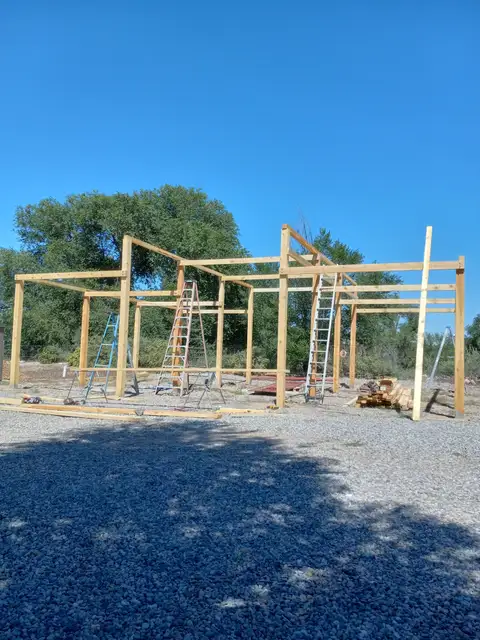 CyJ Tree Service And Handyman framing a new structure near Espanola, NM